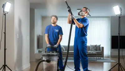 Technician cleaning air ducts for residential HVAC system in Columbia, SC for improved air quality